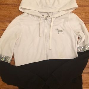 A pink zip-up sweatshirt